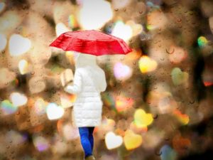 woman in rain-756647_640